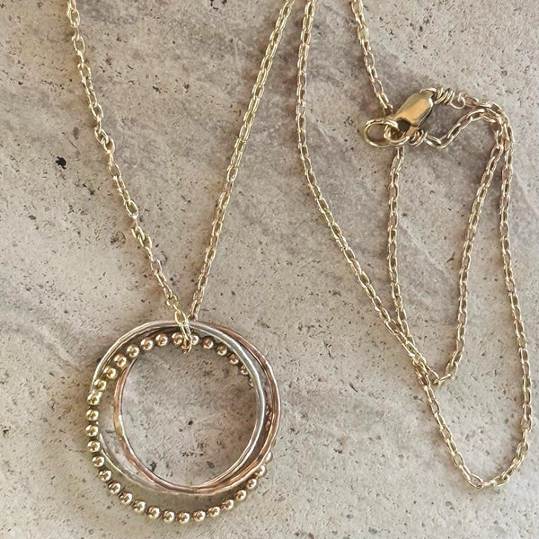 Mixed Metal Trinity Ring with Sterling Silver Bead Wire on a Sterling Silver Chain
