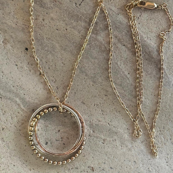 Mixed Metal Trinity Ring with Sterling Silver Bead Wire on a Sterling Silver Chain