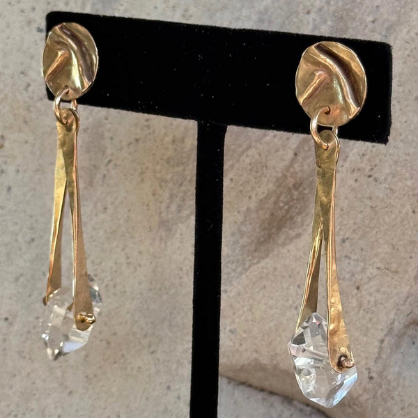 14K Gold Filled Herkimer Diamond Earrings Hanging from a Folded Round Post.