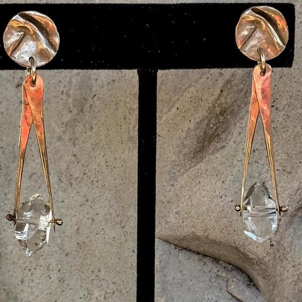 14K Gold Filled Herkimer Diamond Earrings Hanging from a Folded Round Post.